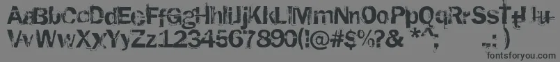 RustedPlastic Font – Black Fonts on Gray Background