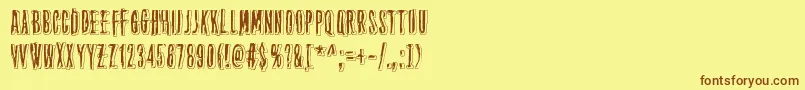 フォントThirteenthFloor2 – 茶色の文字が黄色の背景にあります。