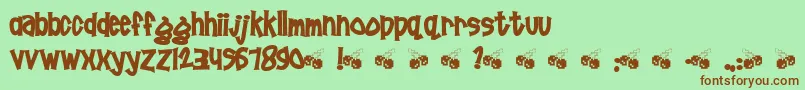 フォントPornhut ffy – 緑の背景に茶色のフォント