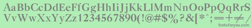 フォントGazetatitulcBold – 緑の背景に灰色の文字