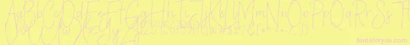 VerticalBrushyFree-fontti – vaaleanpunaiset fontit keltaisella taustalla