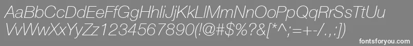 HelveticaLt36ThinItalic-Schriftart – Weiße Schriften auf grauem Hintergrund