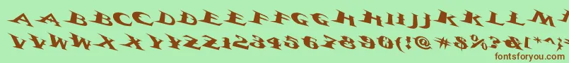 フォントVtcbelialsbladetricked – 緑の背景に茶色のフォント
