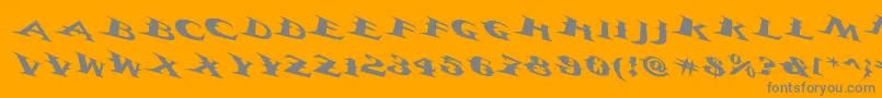 Vtcbelialsbladetricked-Schriftart – Graue Schriften auf orangefarbenem Hintergrund