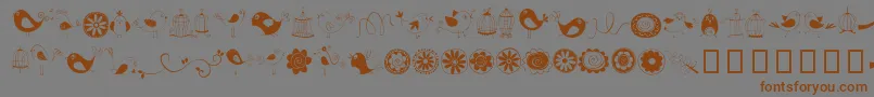 Fonte DoodleDings1BirdsCages – fontes marrons em um fundo cinza