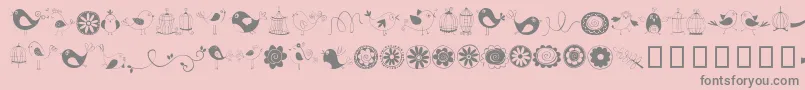 Шрифт DoodleDings1BirdsCages – серые шрифты на розовом фоне