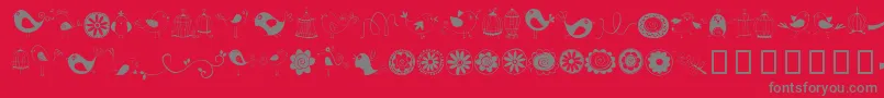Fonte DoodleDings1BirdsCages – fontes cinzas em um fundo vermelho
