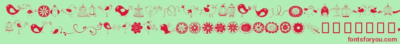 Czcionka DoodleDings1BirdsCages – czerwone czcionki na zielonym tle