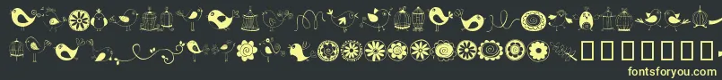 DoodleDings1BirdsCages-fontti – keltaiset fontit mustalla taustalla