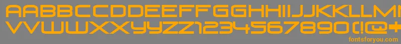 フォントVenusRising – オレンジの文字は灰色の背景にあります。