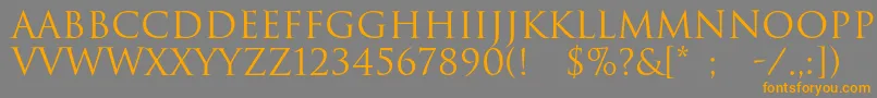 フォントRomul – オレンジの文字は灰色の背景にあります。
