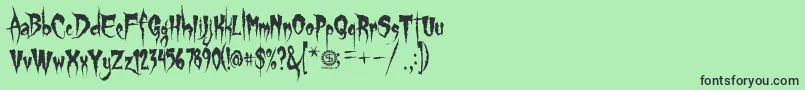 フォントGypsyCurse – 緑の背景に黒い文字