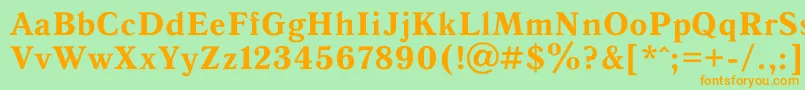 フォントAntiqua0 – オレンジの文字が緑の背景にあります。