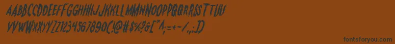 Monsteramaital Font – Black Fonts on Brown Background