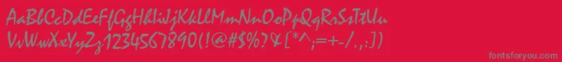 MalagaRegular-Schriftart – Graue Schriften auf rotem Hintergrund