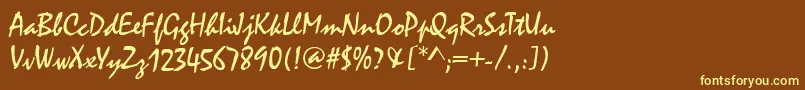 MalagaRegular-fontti – keltaiset fontit ruskealla taustalla