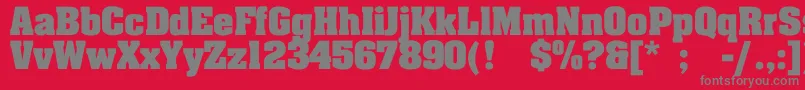 JohnnyBold-fontti – harmaat kirjasimet punaisella taustalla