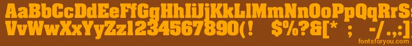フォントJohnnyBold – オレンジ色の文字が茶色の背景にあります。