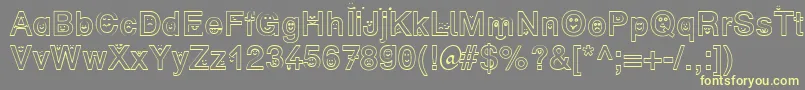 SpFaceDb Font – Yellow Fonts on Gray Background