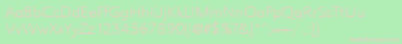 Urwgrotesktextligwid-fontti – vaaleanpunaiset fontit vihreällä taustalla