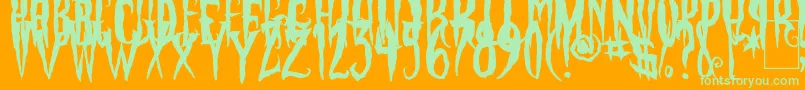 PhantomFingers-Schriftart – Grüne Schriften auf orangefarbenem Hintergrund