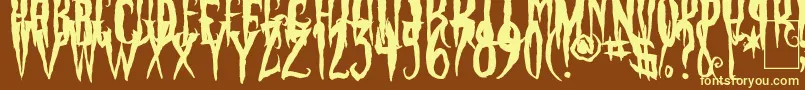 PhantomFingers Font – Yellow Fonts on Brown Background