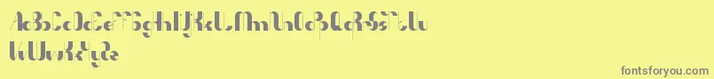 フォントAnythingMeanEverything – 黄色の背景に灰色の文字