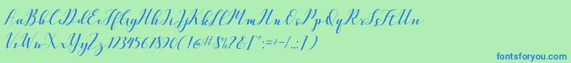 VellesaScriptDemo-Schriftart – Blaue Schriften auf grünem Hintergrund