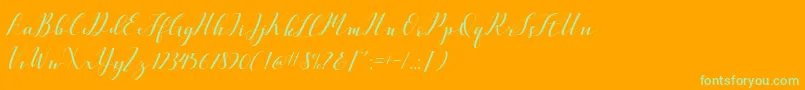 VellesaScriptDemo-fontti – vihreät fontit oranssilla taustalla