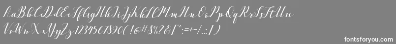 フォントVellesaScriptDemo – 灰色の背景に白い文字