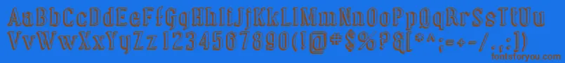 Czcionka Sfcovingtonshadow – brązowe czcionki na niebieskim tle