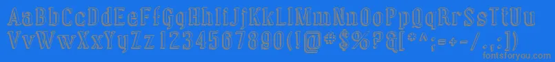 Sfcovingtonshadow-fontti – harmaat kirjasimet sinisellä taustalla