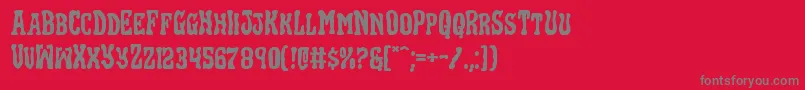 フォントBlackgunkexpand – 赤い背景に灰色の文字