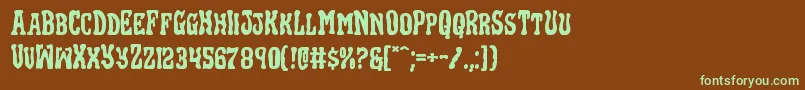 Blackgunkexpand Font – Green Fonts on Brown Background