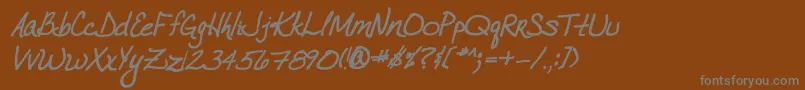 VtcJoelenehandBoldItalic Font – Gray Fonts on Brown Background