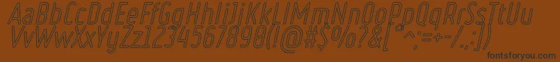 Fonte RulerOutlineItalic – fontes pretas em um fundo marrom