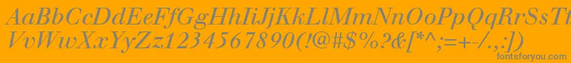 WalbaumLtItalic-Schriftart – Graue Schriften auf orangefarbenem Hintergrund