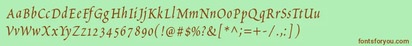 Fonte PetitscriptItalic – fontes marrons em um fundo verde