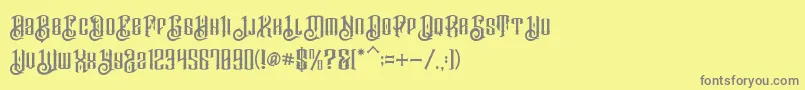 BarakahDemo-fontti – harmaat kirjasimet keltaisella taustalla