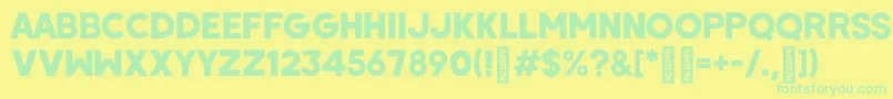 WombyRegular Font – Green Fonts on Yellow Background