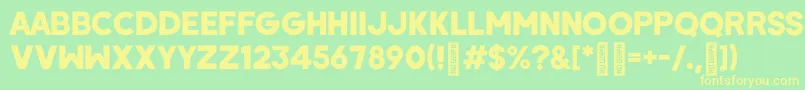 WombyRegular Font – Yellow Fonts on Green Background