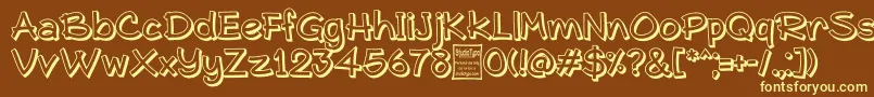 Шрифт TypoComicaOutlineDemo – жёлтые шрифты на коричневом фоне