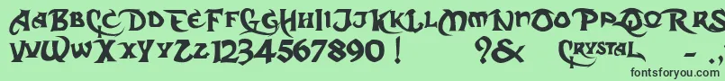 フォントDarkCrystalScript – 緑の背景に黒い文字