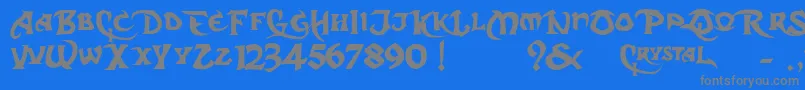 フォントDarkCrystalScript – 青い背景に灰色の文字