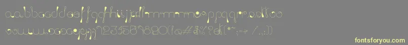 LickingDrops Font – Yellow Fonts on Gray Background