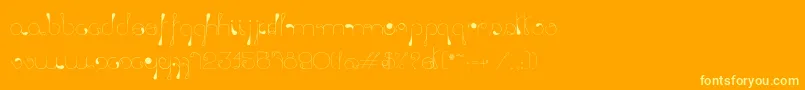 LickingDrops-Schriftart – Gelbe Schriften auf orangefarbenem Hintergrund