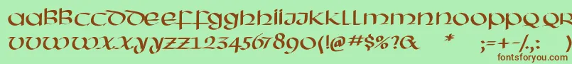 フォントHassianuncial – 緑の背景に茶色のフォント