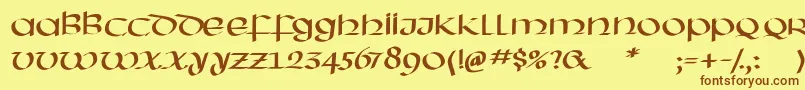 フォントHassianuncial – 茶色の文字が黄色の背景にあります。