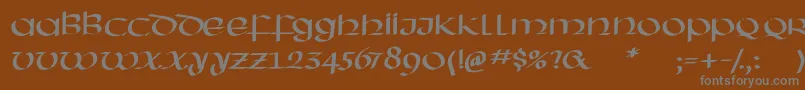 フォントHassianuncial – 茶色の背景に灰色の文字