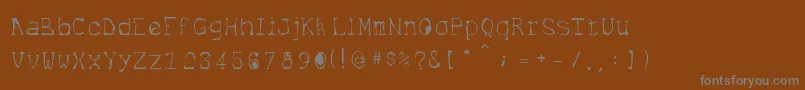Internet-Schriftart – Graue Schriften auf braunem Hintergrund